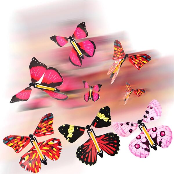 10 adet Uçan Kelebek Yeni Egzotik Komik Sürpriz Saat Yönünde Döndürme Plastik Uçan Kelebek Sihirli Hileler Bebek Oyuncakları 1