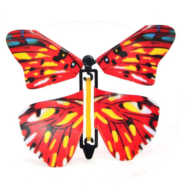 10 adet Uçan Kelebek Yeni Egzotik Komik Sürpriz Saat Yönünde Döndürme Plastik Uçan Kelebek Sihirli Hileler Bebek Oyuncakları 2