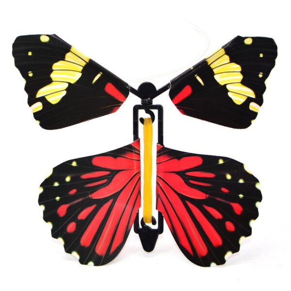 10pc Flying Butterfly جدید عجیب و غریب خنده دار سورپرایز چرخش جهت عقربه های ساعت پلاستیکی پرواز پروانه ترفند جادویی اسباب بازی کودک 3