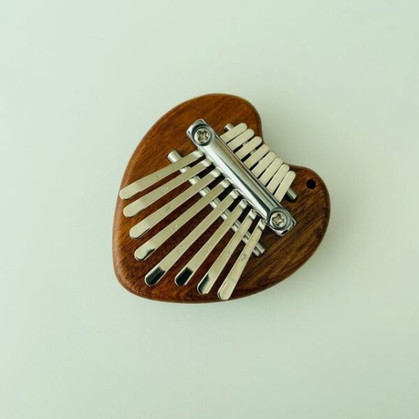 Mini piano de dedos Kalimba de 8 teclas, accesorios exquisitos, instrumento musical de xoguete, piano de pulgar